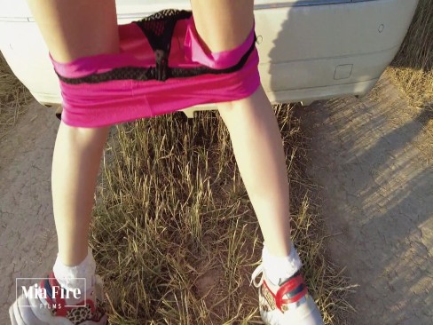 Fitness girl Mia Fire fucked in the field by the car | AMATORPORR.COM