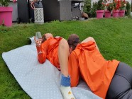 Pussy licking and blowjob in the garden in greasy rainwear ad rubber boots